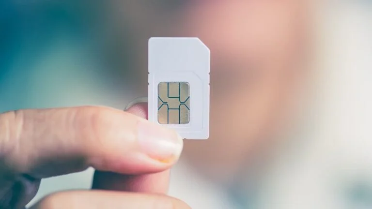 holding a sim card